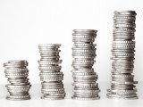 Quatre piles de pièces de monnaie