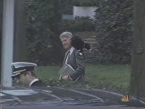 Le chat du président américain Bill Clinton posé sur ses épaules