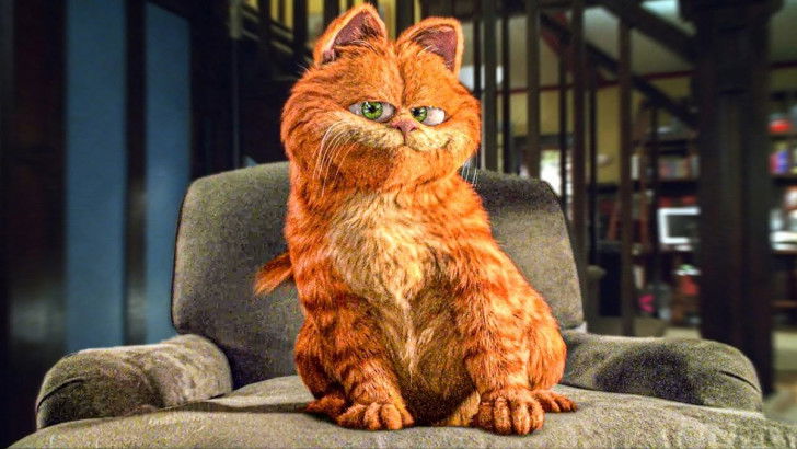 Le chat en images de synthèse du Film « Garfield » assis sur un fauteuil