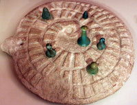 Le Mehen, un jeu de l'antiquité égyptienne avec des pièces en pierres