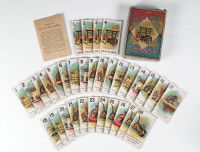 Les cartes et la boîte du jeu « The Game of Puss in the Corner »