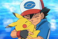 Sacha faisant un câlin à Pikachu